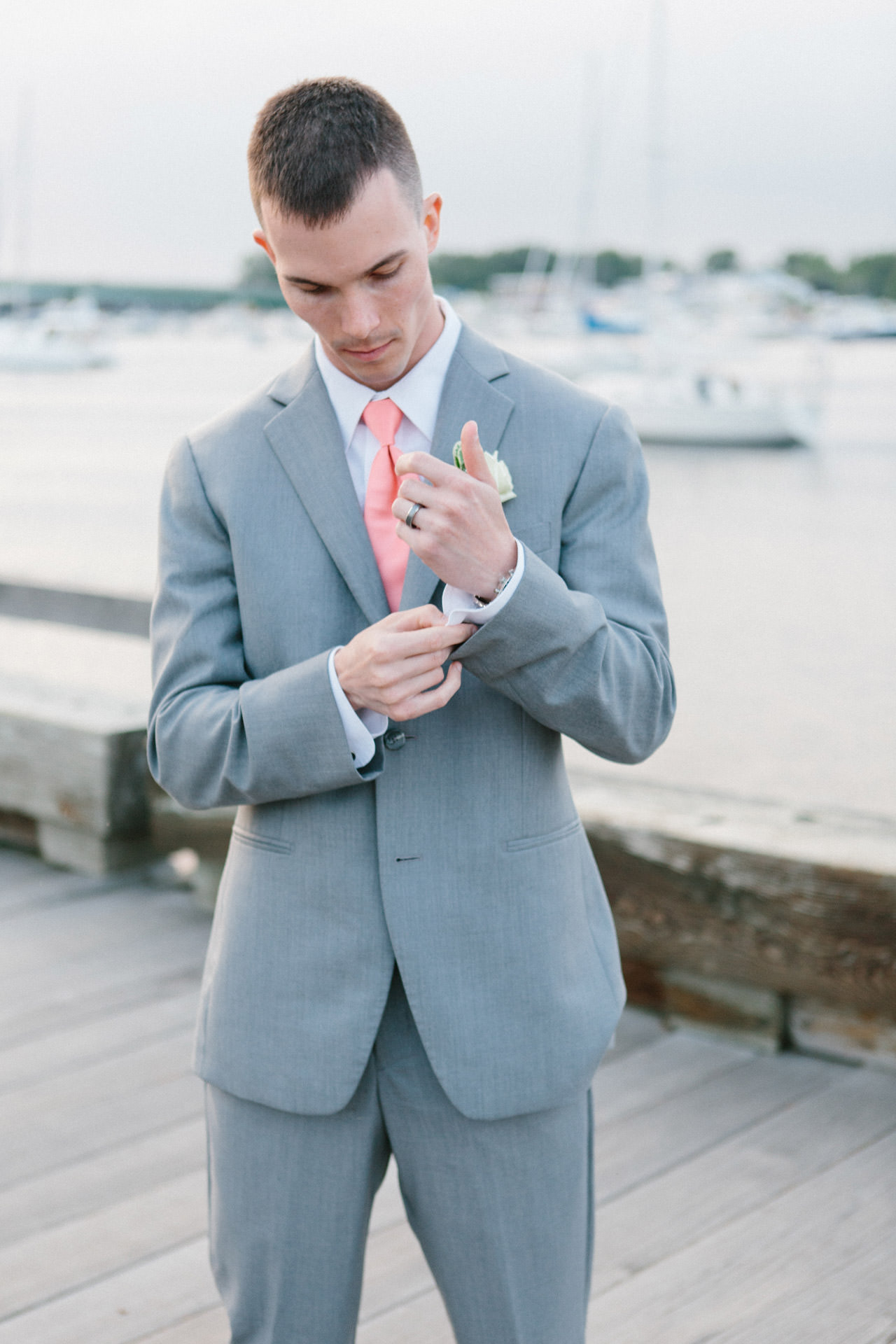 Groom posing for a photograph at the Custom House Maritime Museum in Newburyport, MA