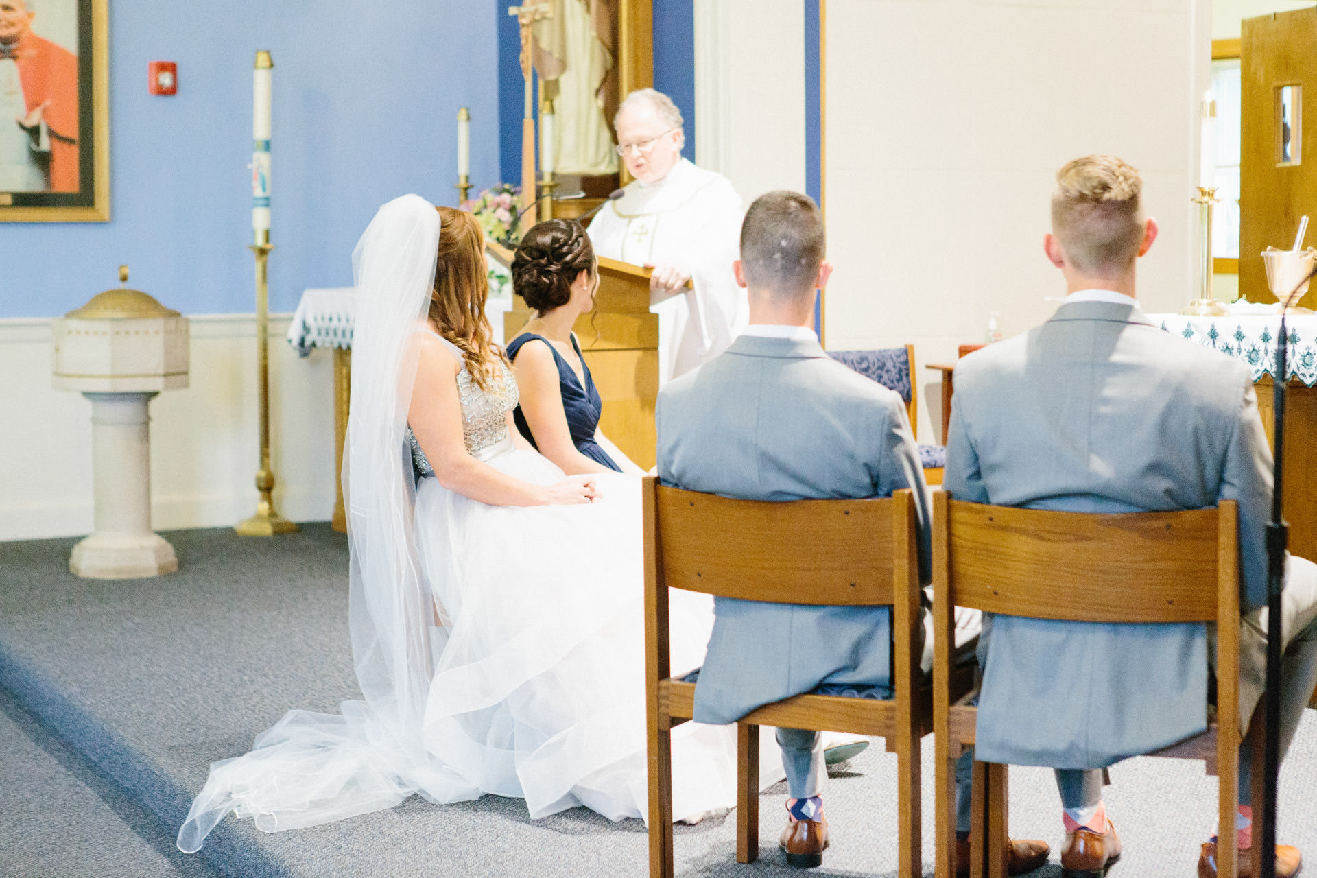 Bride and Groom sitting during their wedding ceremony
