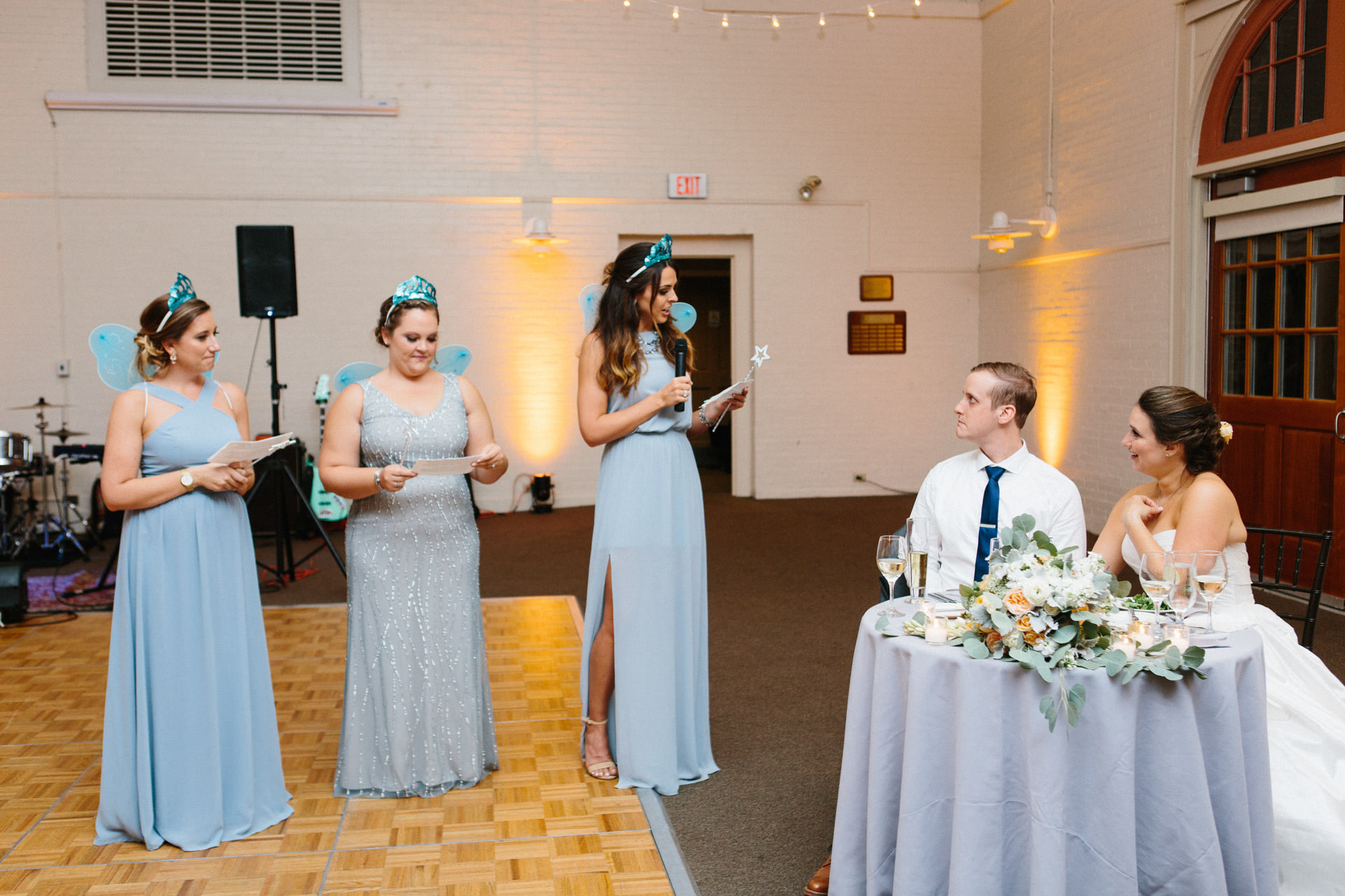 Maid of honor delivering her speech during the reception