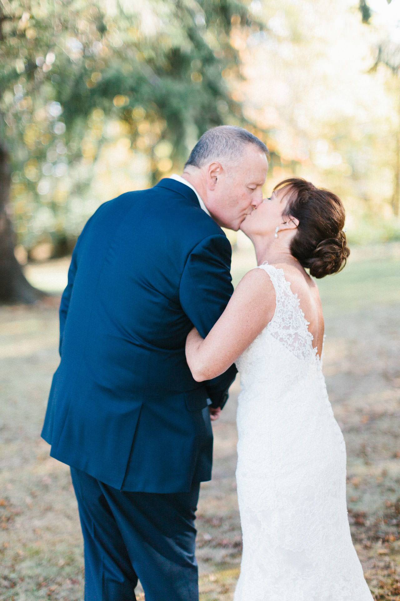 Bride and Groom kissing during wedding portraits