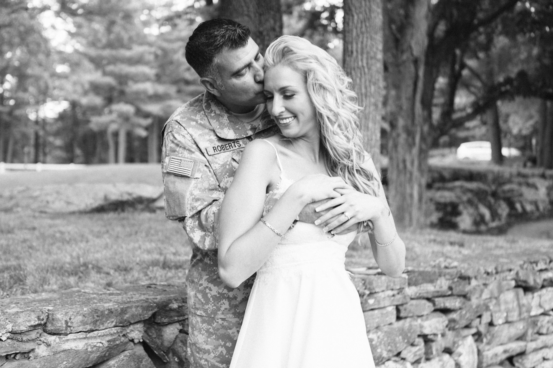 Couple posing during their New England engagement shoot at Ross Haven Farm in Sturbridge, MA