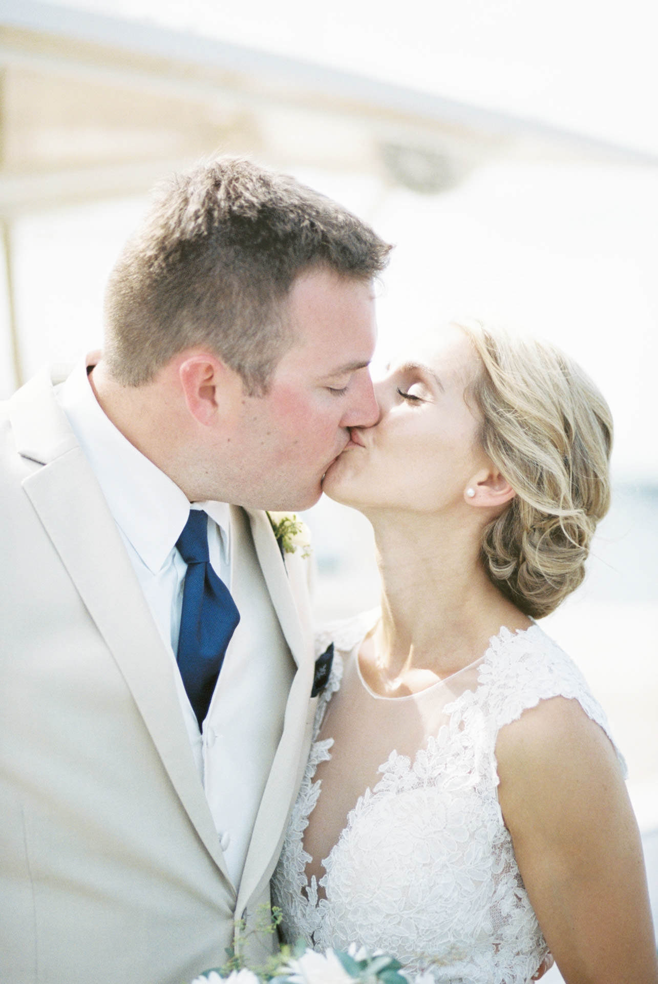 Bride and Groom kissing at their Cape Cod wedding at The Coonamessett Inn in Falmouth, MA