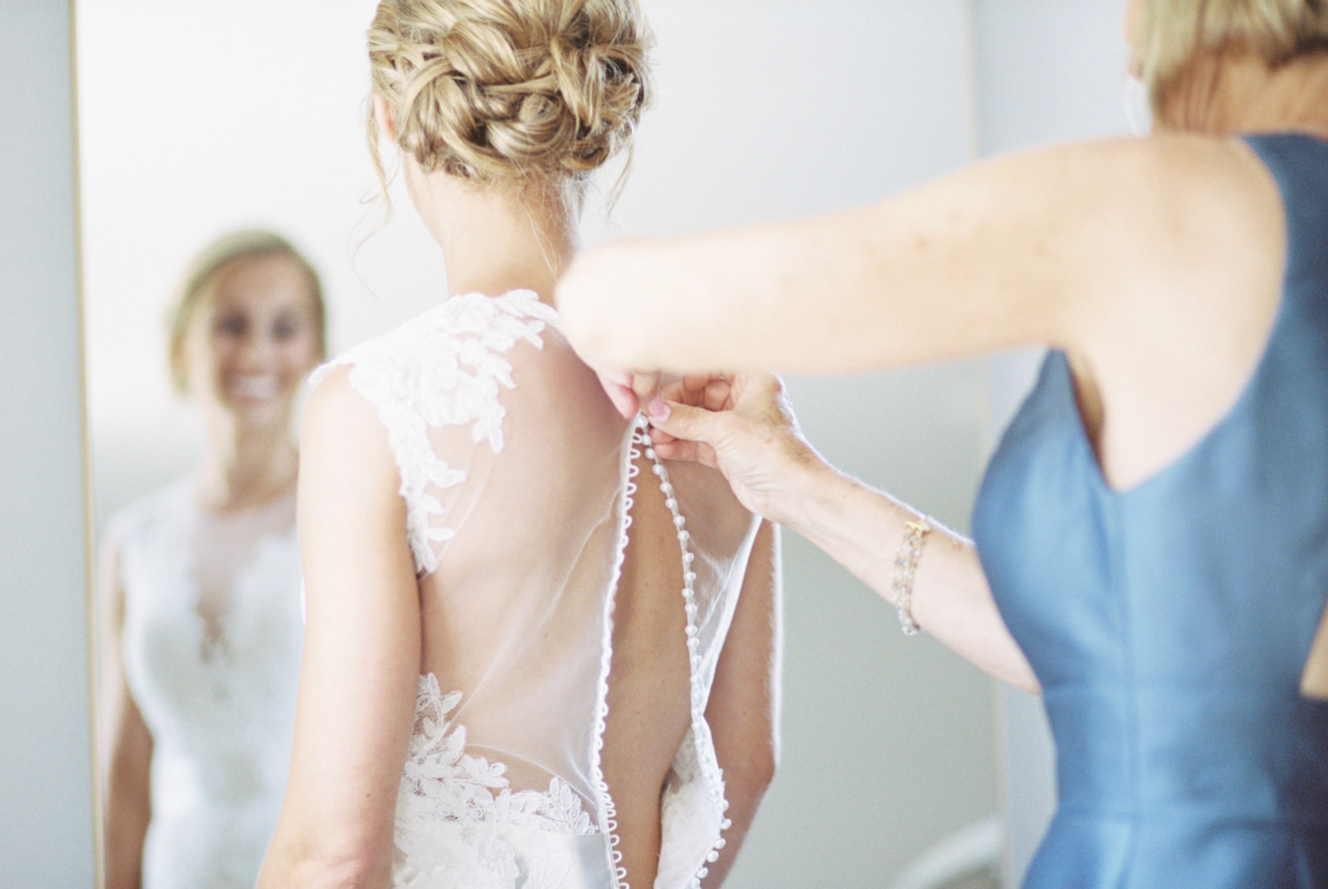 Bride photographed in her dress at her Cape Cod wedding at the The Coonamessett Inn in Falmouth, MA