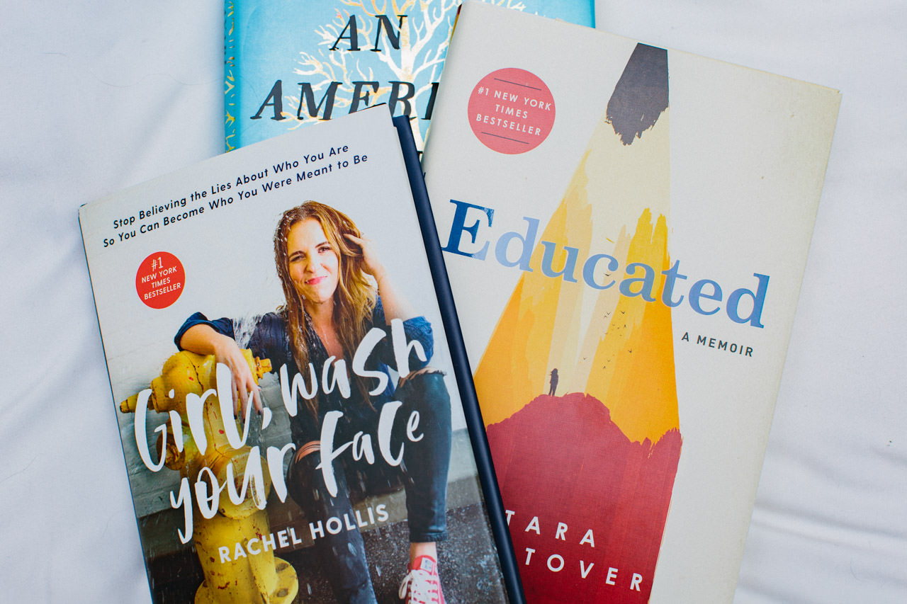 Photograph of books Girl, Wash Your Face by Rachel Hollis, An American Marriage by Tayari Jones, and Educated by Tara Westover
